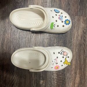 White crocs with charms